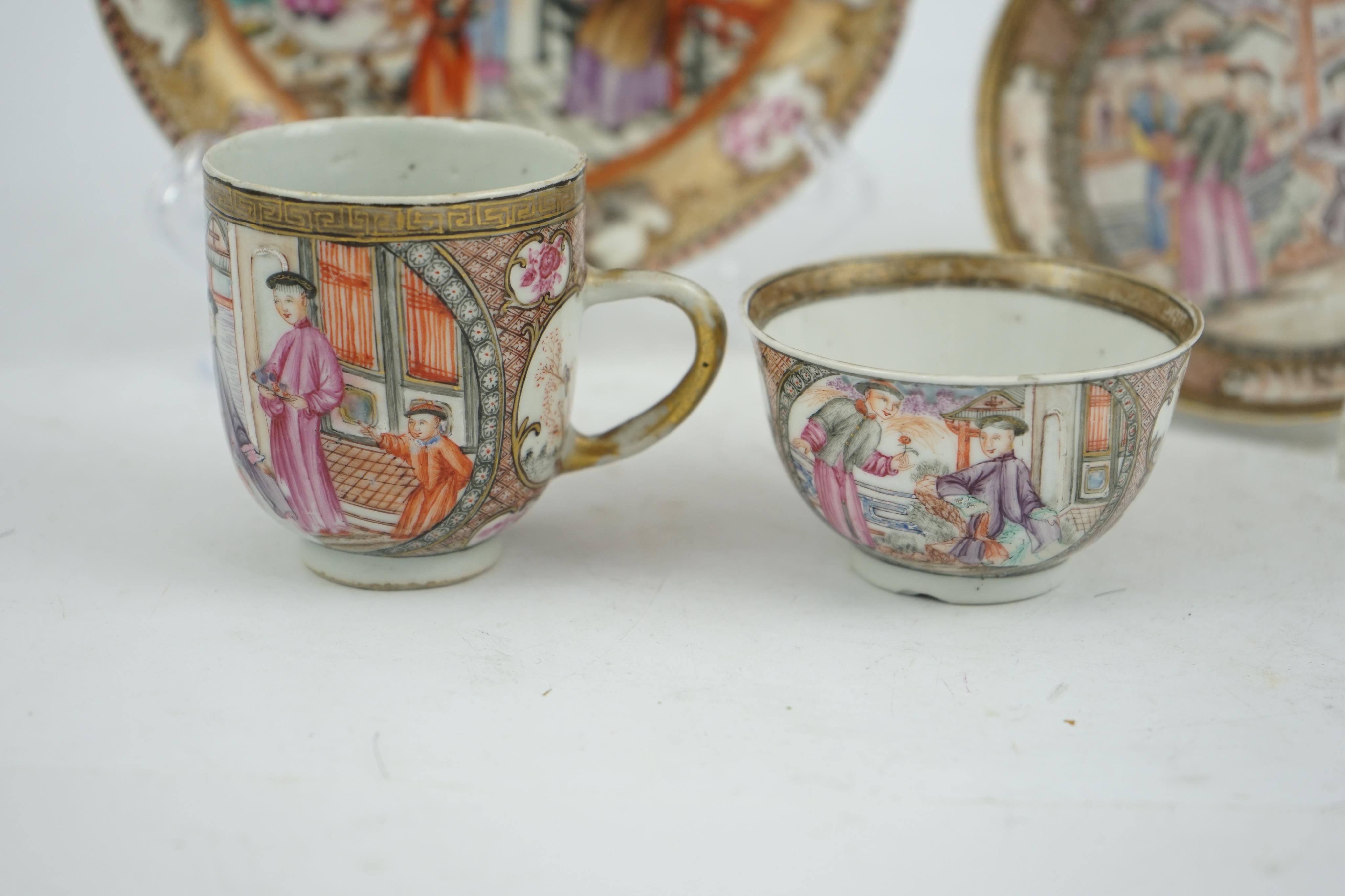 A Chinese ‘mandarin’ pattern tea bowl, coffee cup and saucer, Qianlong period